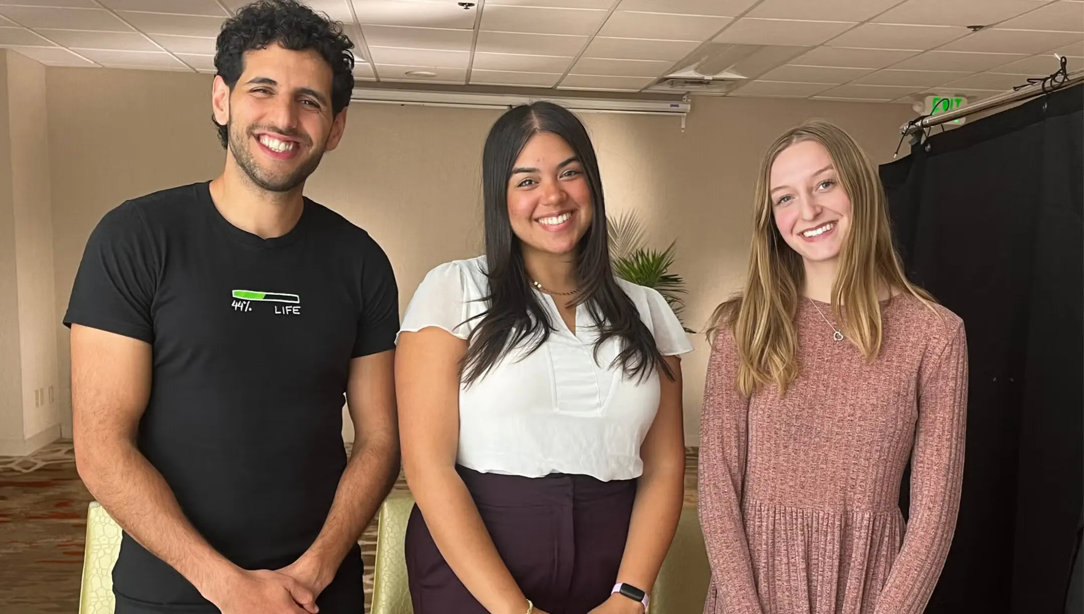 Social media entrepreneur Nuseir Yassin, left, stands with fellows Raihaana Adira and Grace (right) at a conference hosted by the David Merage Foundation for Confronting Antisemitism, in Denver, Colorado, on Oct. 20, 2026.