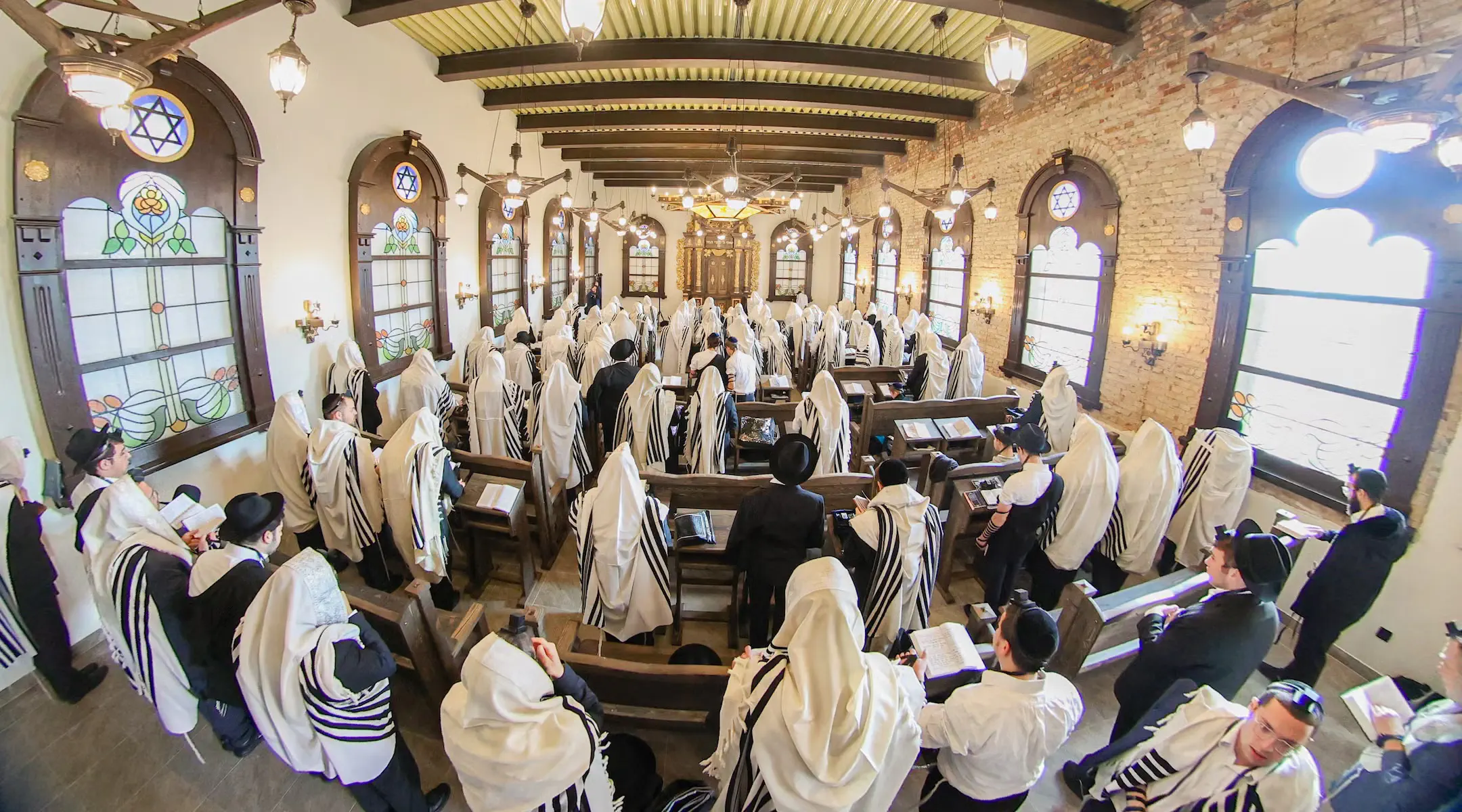 Orthodox Jews pray at the newly-reopened Radin Yeshiva. Credit: A. Aizenbach