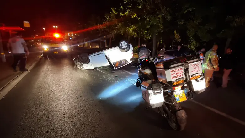 Man survives car crash - and is killed by police car