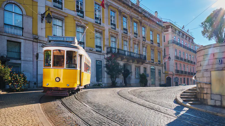 Lisbon’s iconic streetcar derails, leaving 15 dead