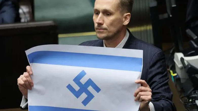 On Holocaust Remembrance Day: Polish MP displays Israeli flag with a swastika