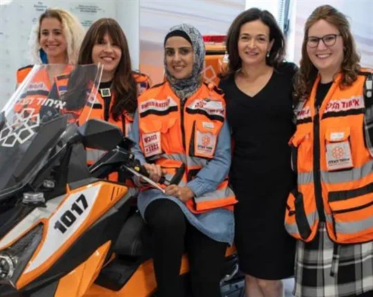 Sheryl Sandberg, second from right, poses with members of United Hatzalah's women