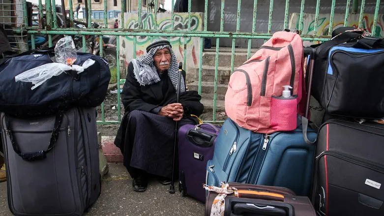 Gazans wait to cross into Egypt through Rafah border crossing