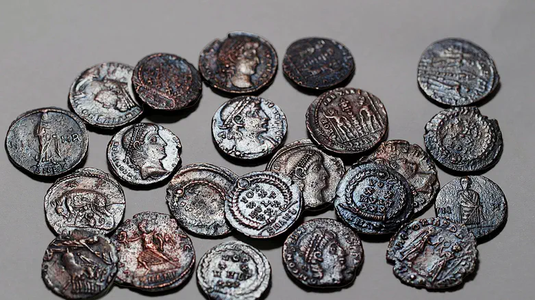 22 ancient copper coins found during excavations in the Galilee                      Credit: Emil Aladjem, Israel Antiquities Authority