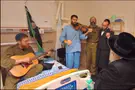 Karliner Rebbe sings with seriously wounded soldier