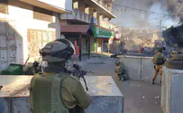 Arab rioters throw objects at IDF troops