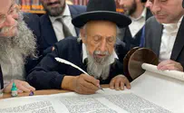 Torah sages inscribe final letters in scroll written for yeshiva