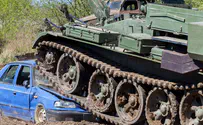Ukrainian civilian survives being run over by Russian tank