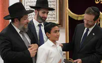 President Herzog's gift to boy who lost father in terror attack