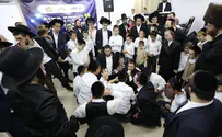 Students at special yeshiva celebrate with the Torah