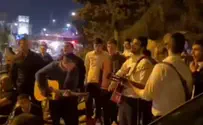 Dozens of yeshiva students sing at scene of Jerusalem attack