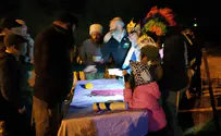 Evyatar families read Book of Esther at Tapuah junction