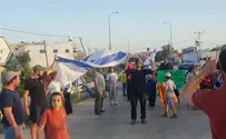 Israelis protest at entrance to Arab village in Jordan Valley
