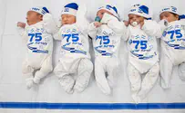 Hospital dresses babies in blue and white for Independence Day