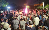 Rabbi Zalman Baruch Melamed lights bonfire at Beit El Yeshiva