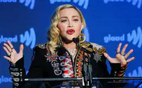 Madonna postpones world tour after hospitalization