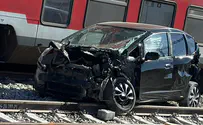 Two women lightly injured as train strikes car in Lod