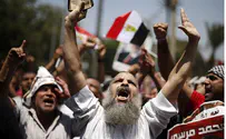 Egypt Freezes Brotherhood's Assets, Arrests its Spokesman