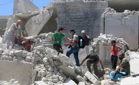 Barrel bomb attack in Syria's Aleppo kills 11 children