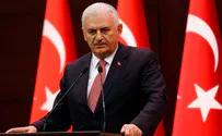 Turkish PM: Assad may have a short term role in Syria