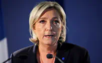 Le Pen temporarily steps down from her party