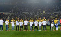 Watch: Terror-stricken children honored at J'lem soccer stadium