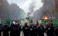 Protesters riot against fuel tax in Paris