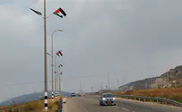 Who placed PLO flags on Judea and Samaria roads?