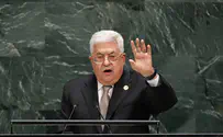 Abbas calls for international peace conference next year