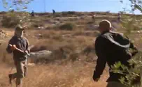 Watch: Jewish residents attack reporter with stones