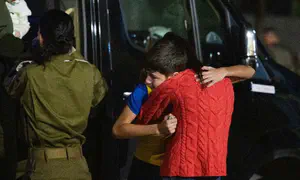 Freed hostage Eitan Yahalomi reunites with his mother in Israel