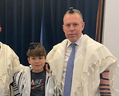 UN Ambassador's son puts on tefillin for the first time