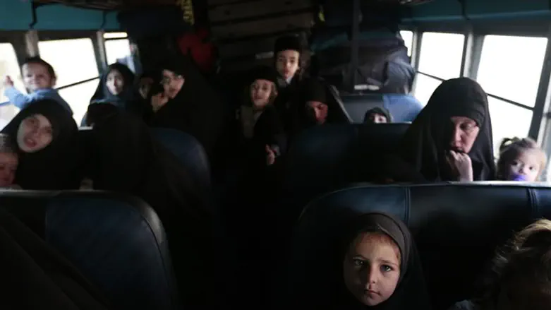 Members of Lev Tahor on a bus