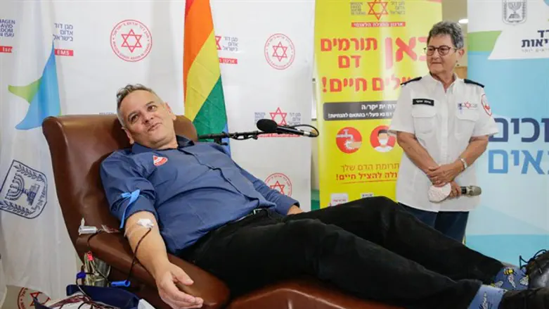 Health Minister Nitzan Horowitz donates blood at a MDA station in Jerusalem