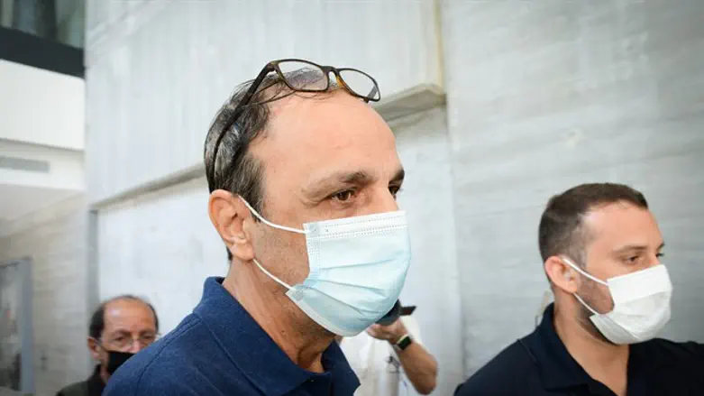 Shmuel Peleg arrives for a court hearing over charges of kidnapping Eitan Biran