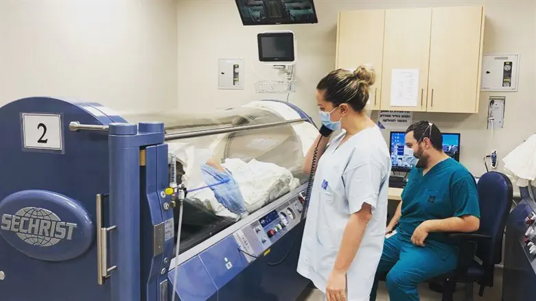Hospital staff with one of the patients