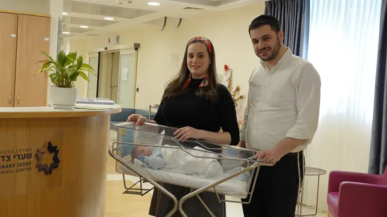 The couple and their new baby