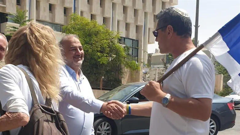 MK Mansour Abbas with activists for "bringing our boys home"
