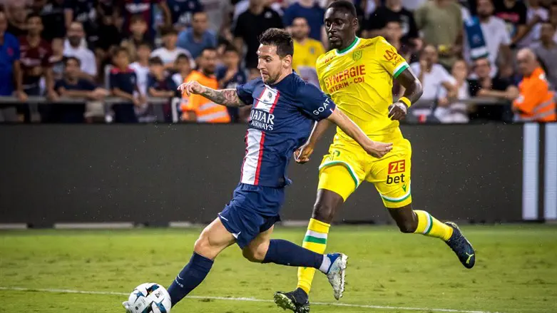 Messi closes in to score the opening goal at the Super Cup in Tel Aviv
