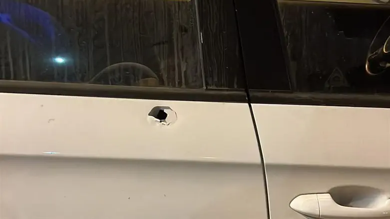 One of the bullet holes in the car