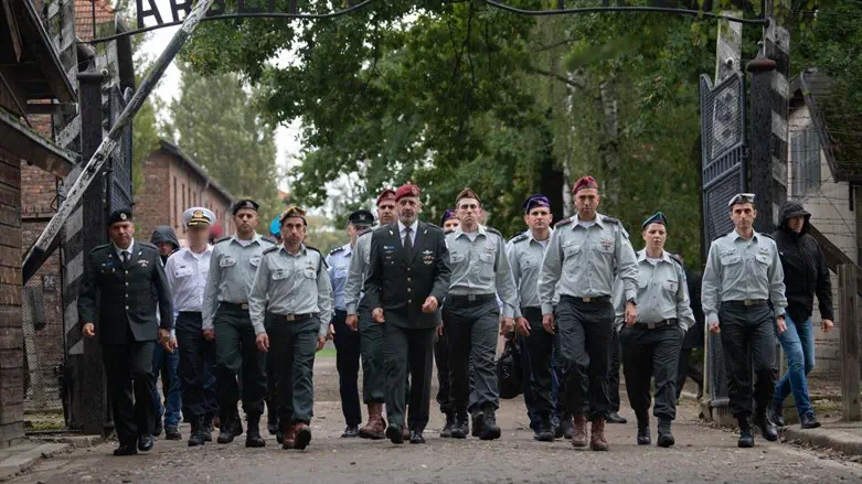 The Chief of Staff and his delegation at the entrance to the Auschwitz camp