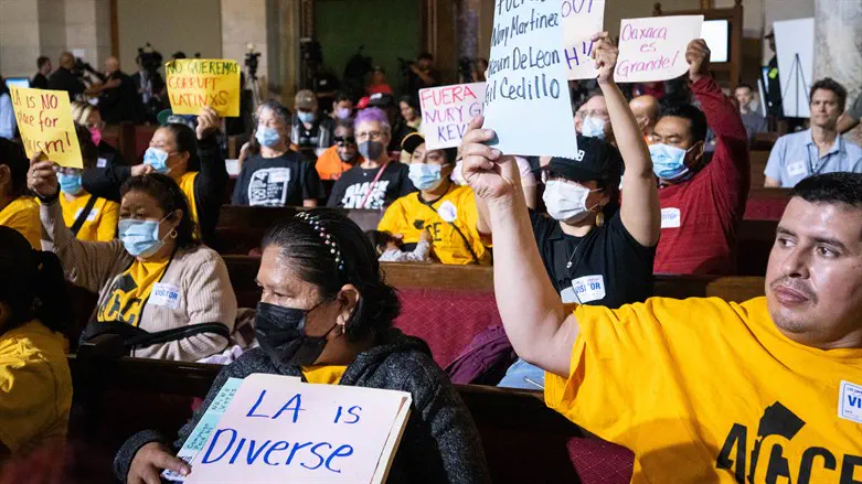 Protesting at LA City Council meeting after council members were made racist comments.