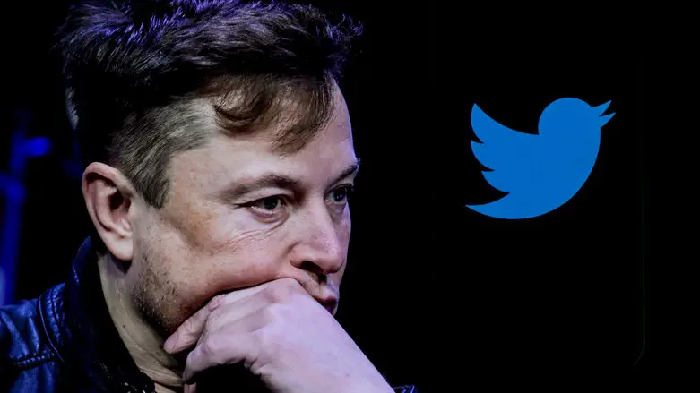 Image of Elon Musk displayed on a computer screen and Twitter's logo on a mobile phone