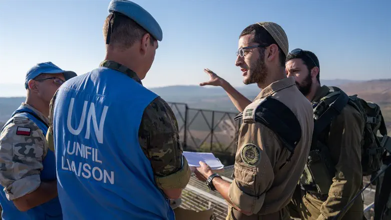 IDF soldiers and UNIFIL officials on the Israel-Lebanon border
