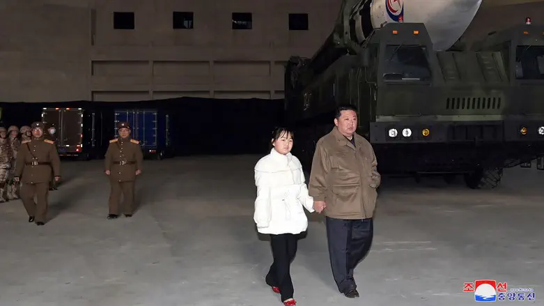North Korean leader Kim Jong Un, along with his daughter, inspects an ICBM in th