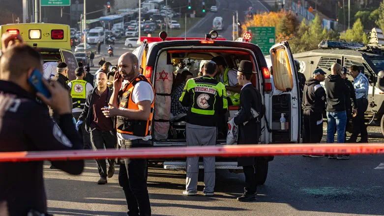 Police and security personnel at the scene of a Jerusalem bombing