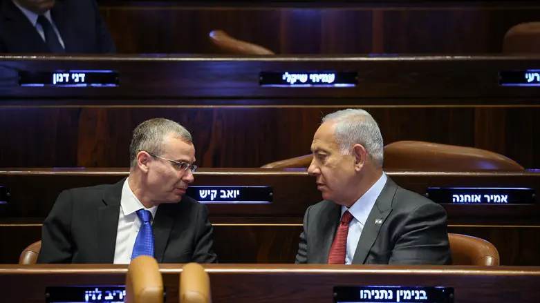 Justice Minister Yariv Levin and Benjamin Netanyahu
