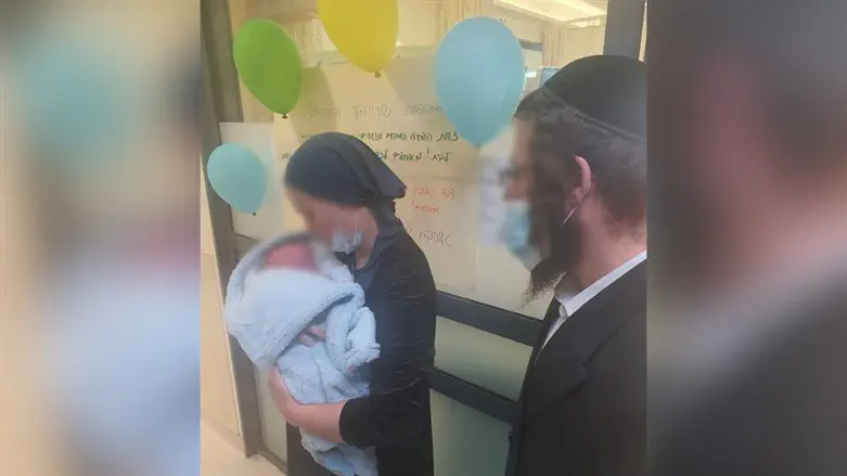 Liba Ahuva Schreiber leaves hospital with her child