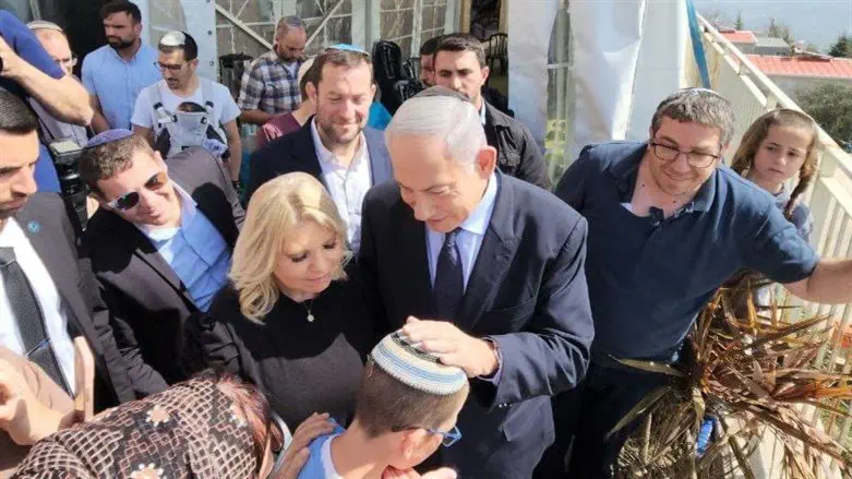 Benjamin Netanyahu blesses the victims' younger brother Tzur