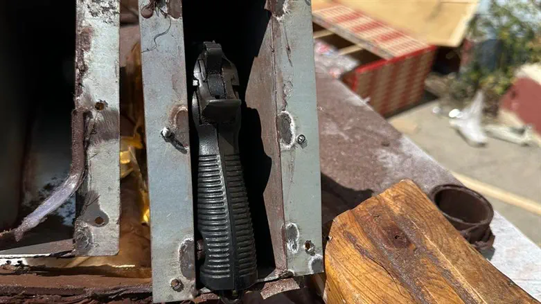 A pistol hidden in a piece of furniture